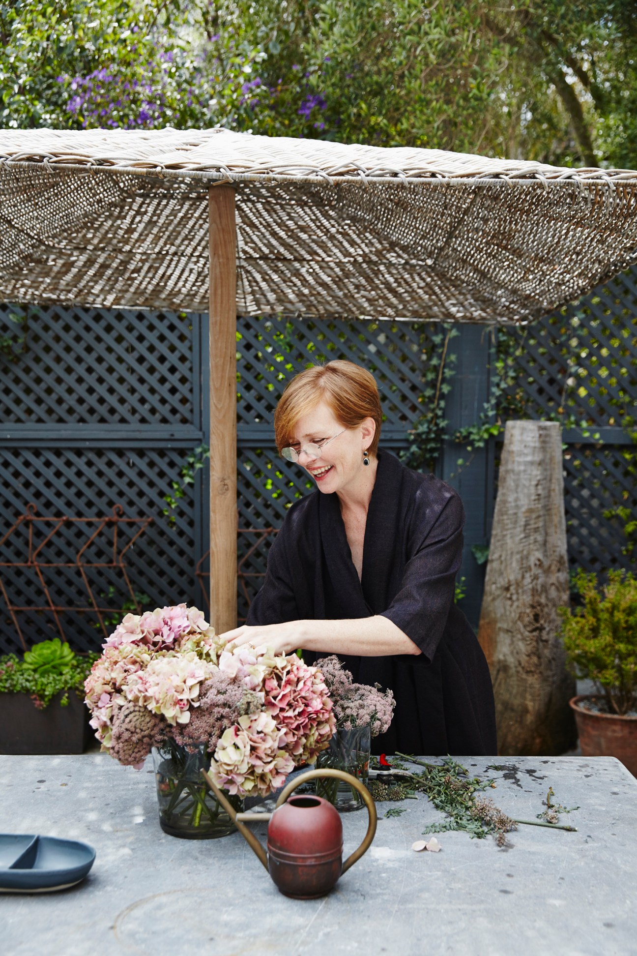 Fresh produce and gourmet ingredients artfully arranged in a shopping basket or market display