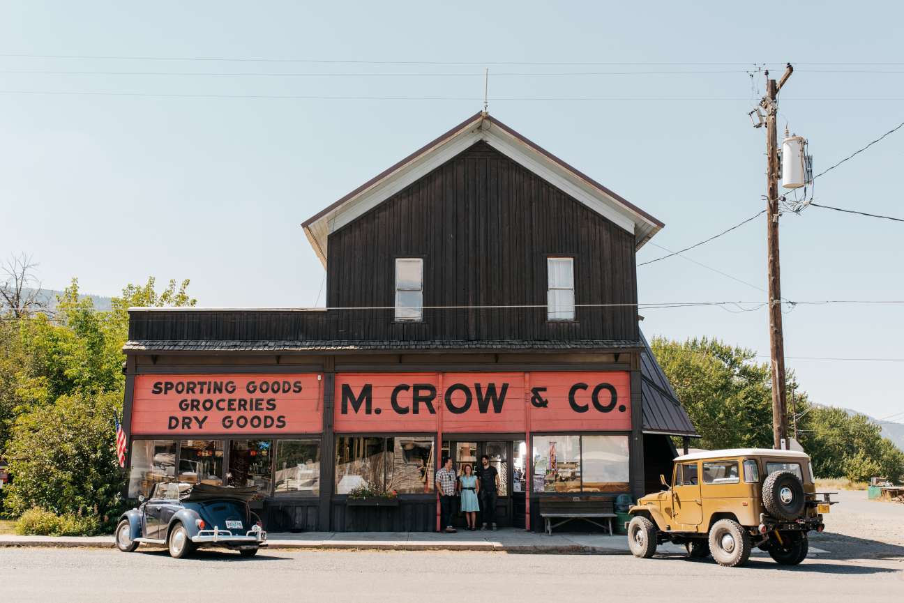 M Crow & Co general store exterior with red storefront in rural Oregon mountain town