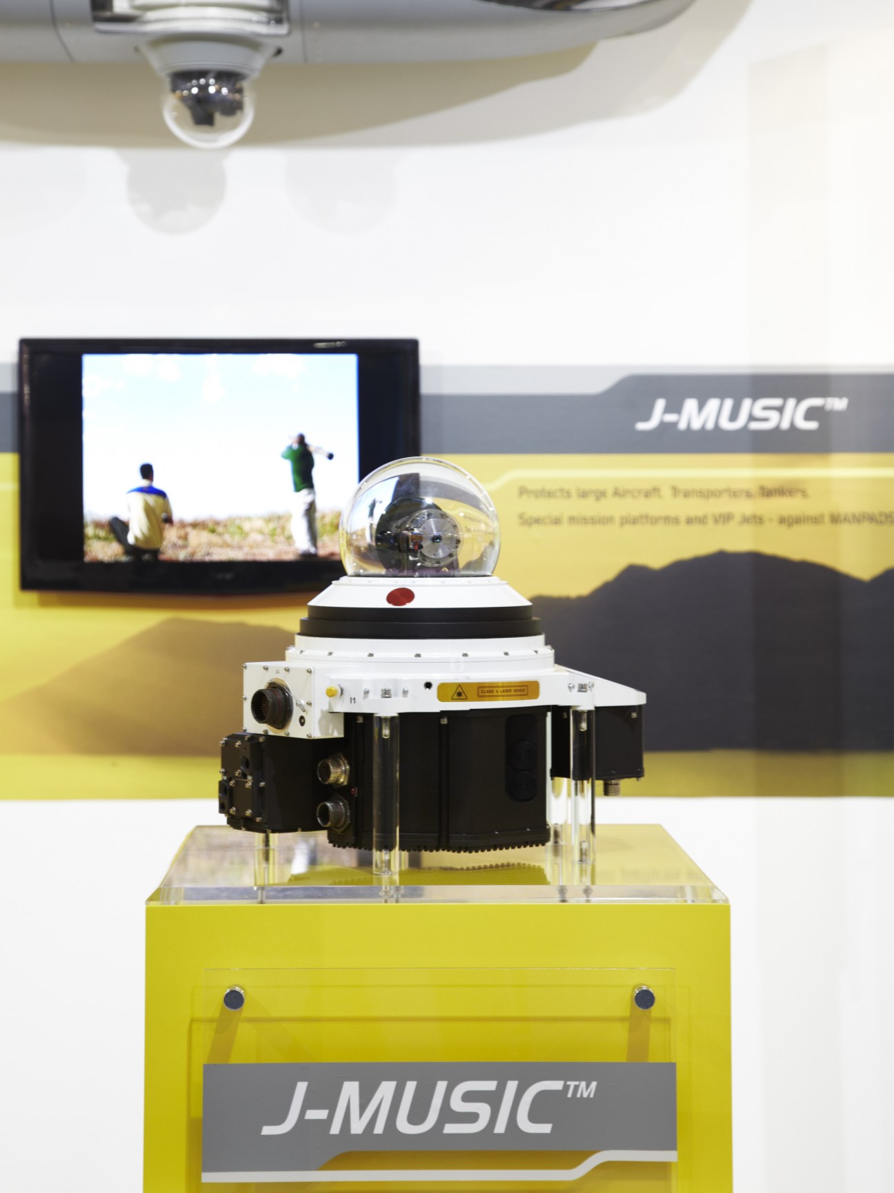 Elbit's J-Music infrared countermeasures system on display with dome and electronic components.