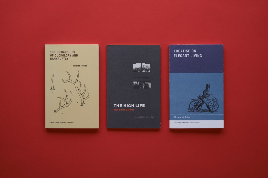Three book covers displayed against a red background: a cream-colored book on Cuckoldry and Bankruptcy, a dark navy book titled The High Life, and a blue book titled Treatise on Elegant Living.