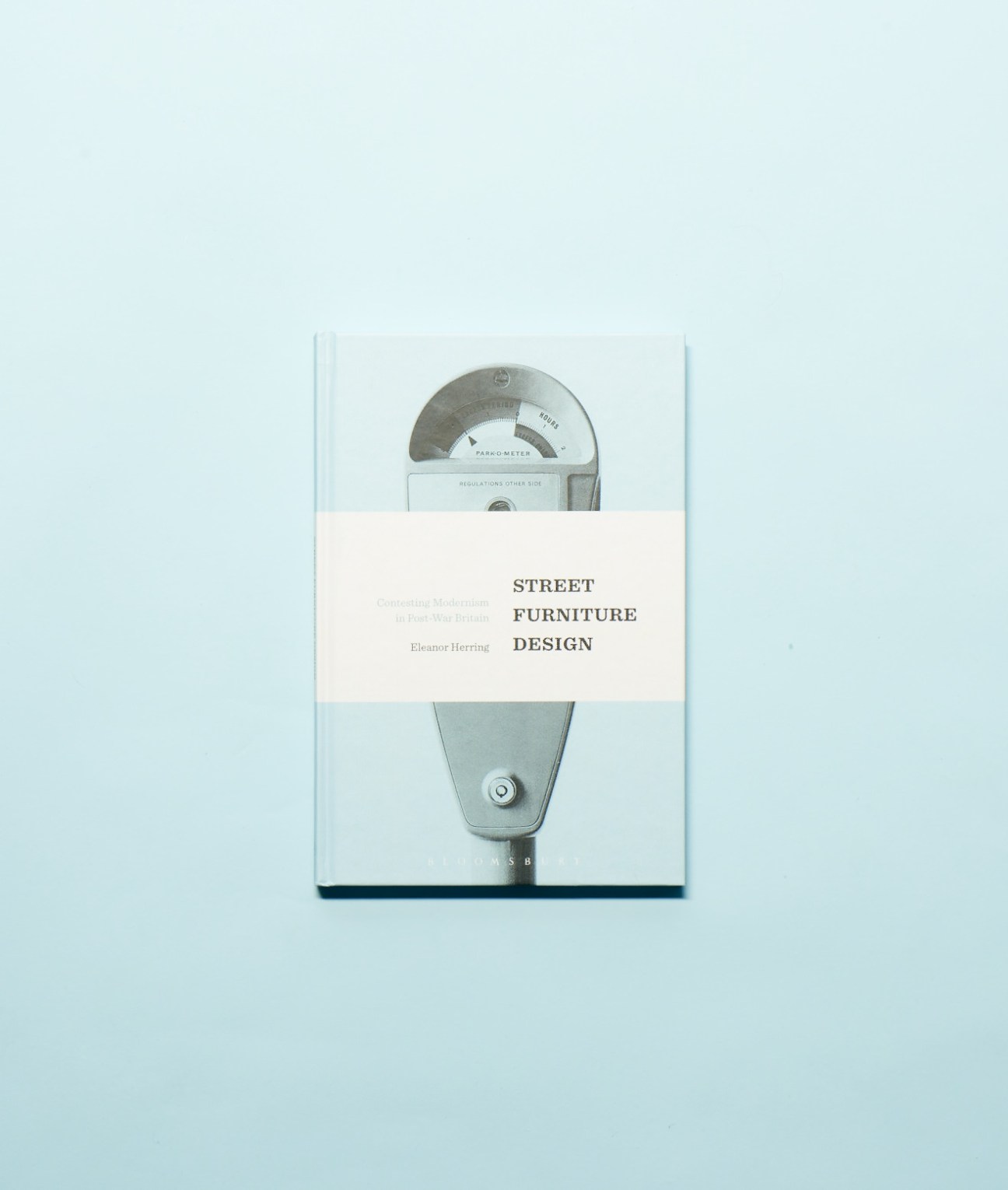 Cover of Eleanor Herring's book 'Street Furniture Design' featuring a vintage parking meter on light blue background.