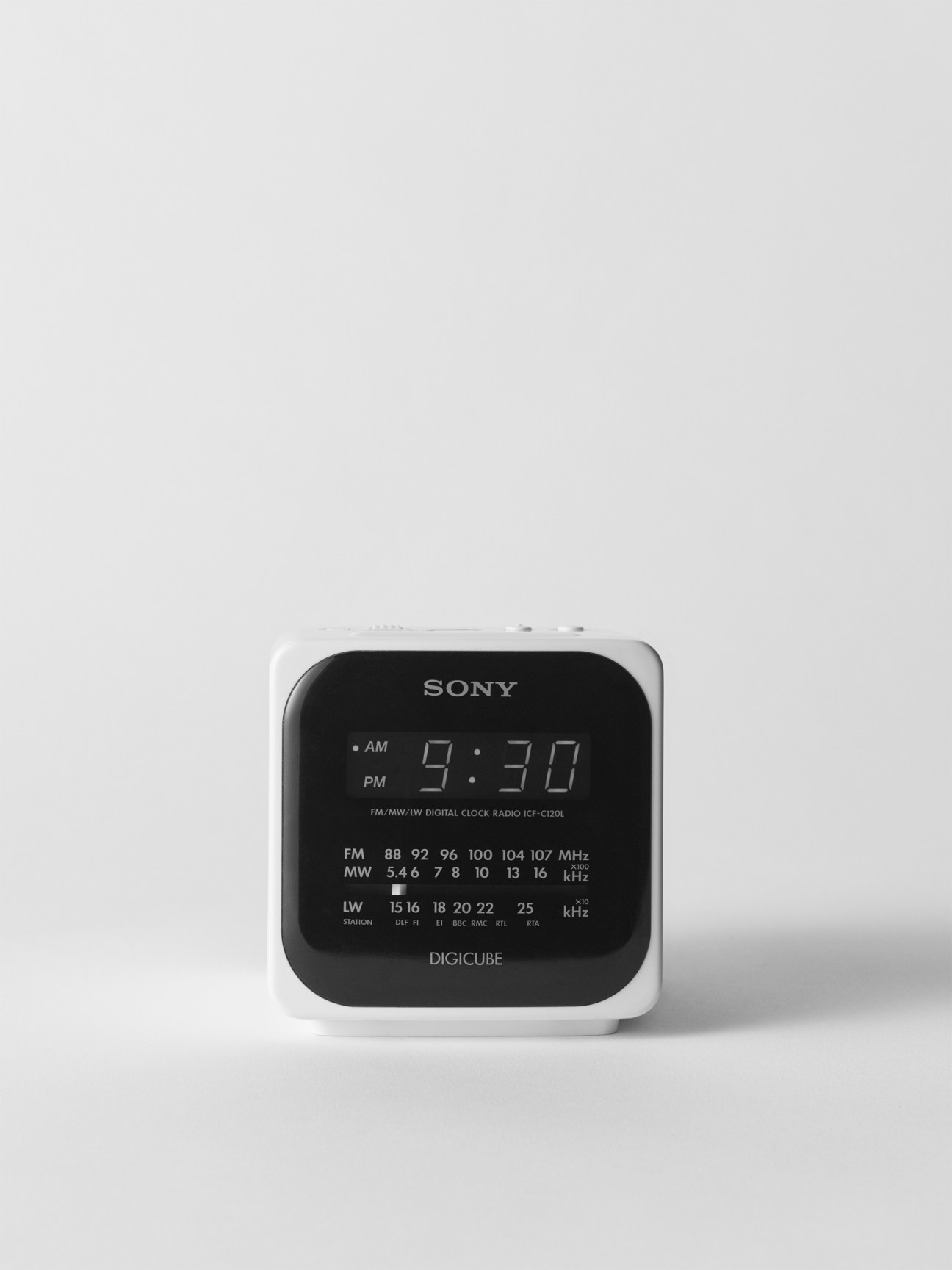Sony digital clock radio displaying 9:30 AM with FM/MW/LW frequency bands listed on black display