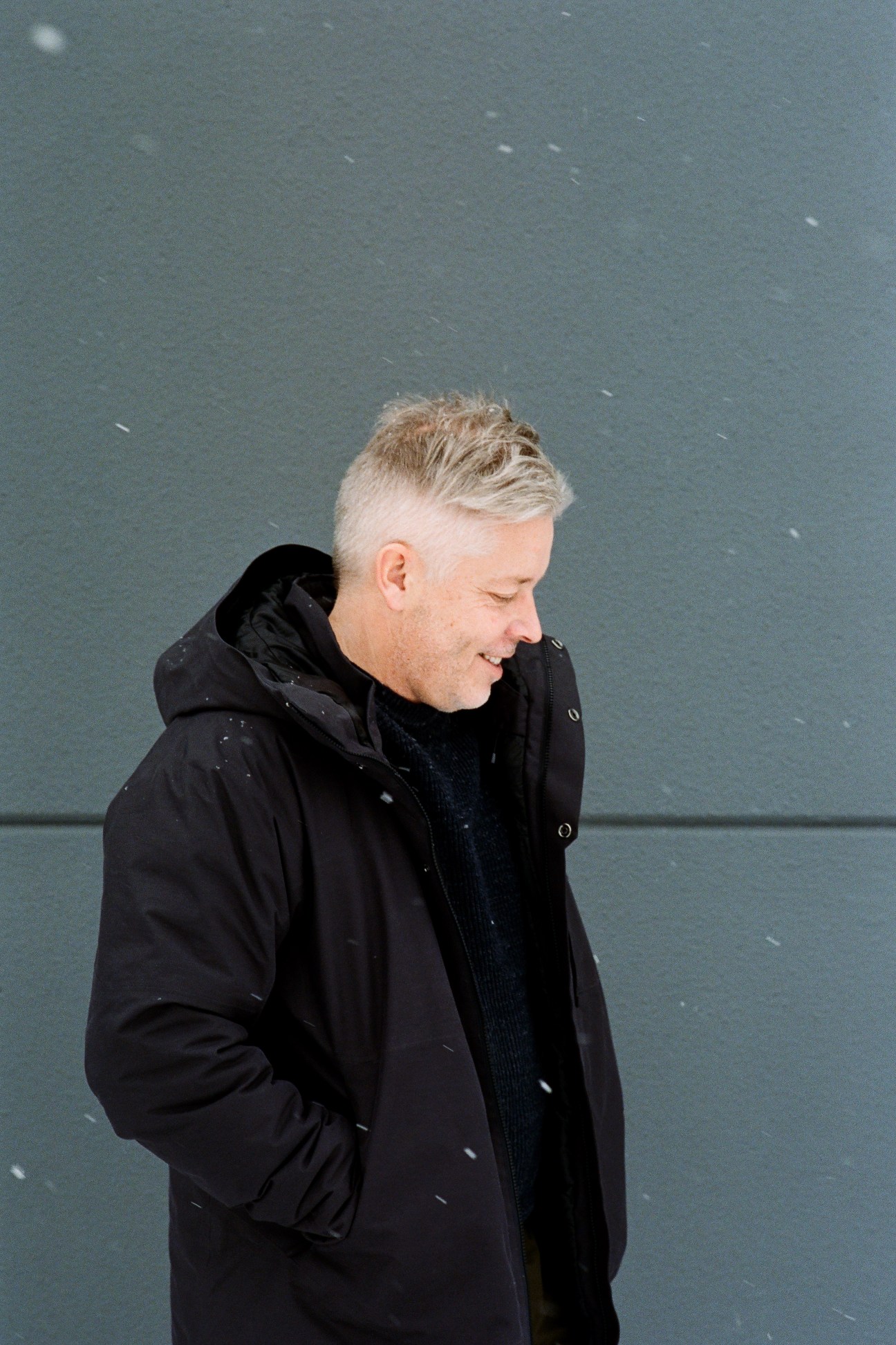 Marcus Engman, Ikea's chief creative officer, stands in profile wearing a black jacket against a gray wall.