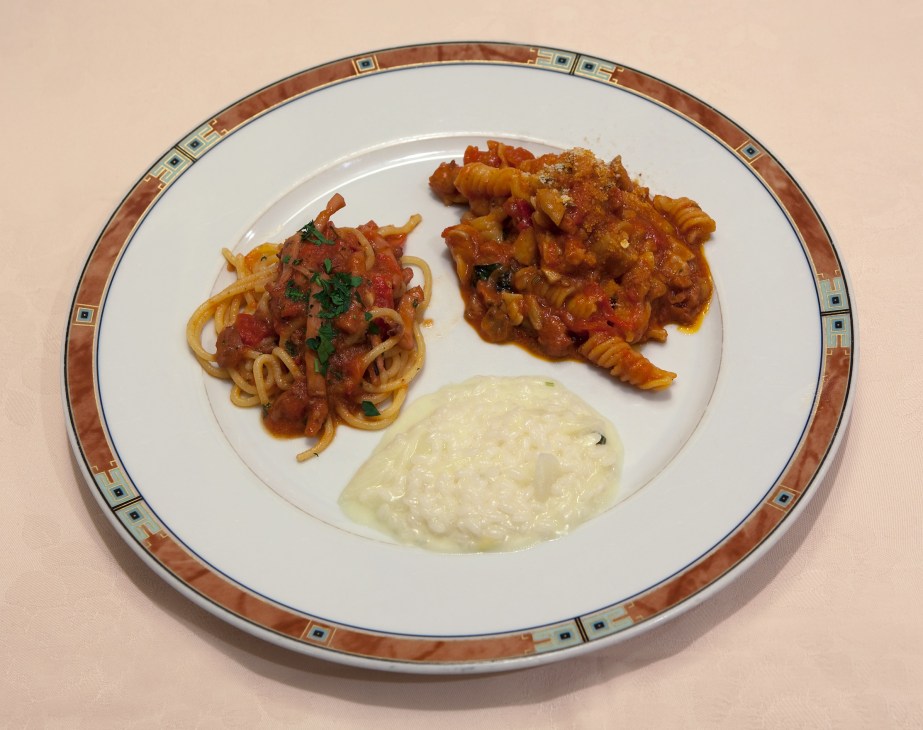 Plate of spaghetti with squid and tomato sauce at Elio Locanda Italiana in Tokyo.