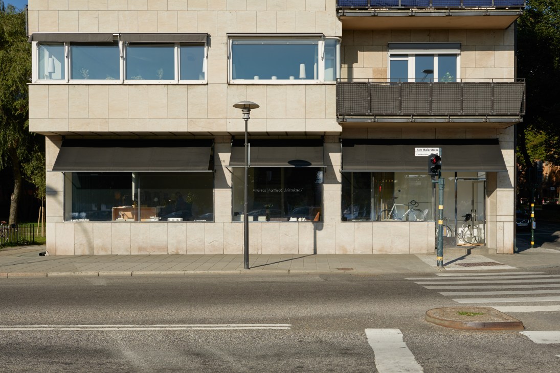 Modern beige stone building with large windows and balconies on Kungsholmen Island
