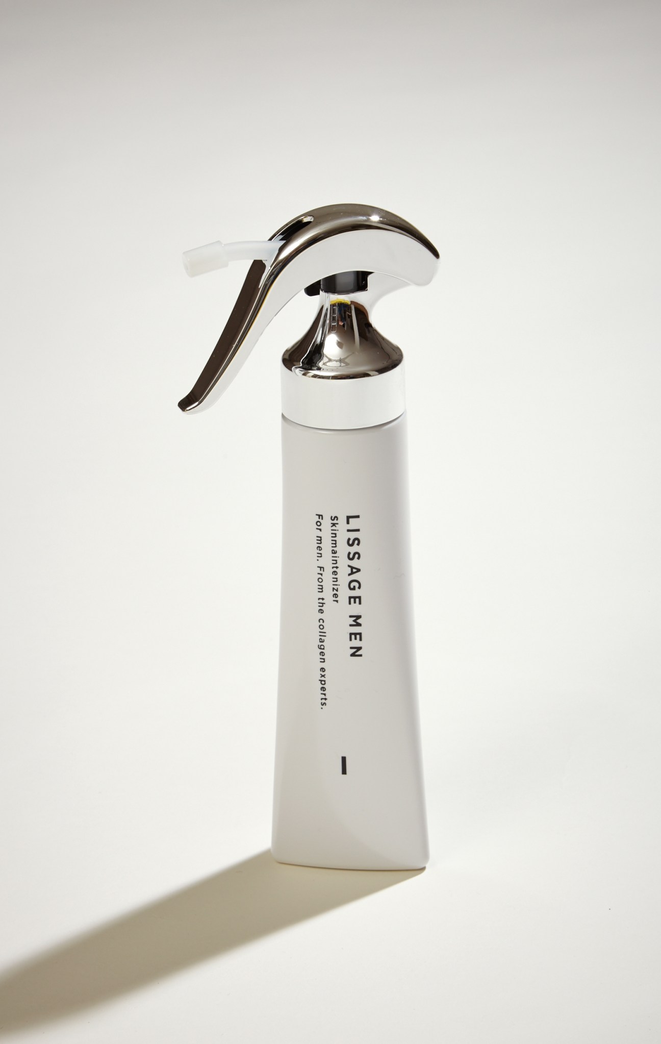 Lissage Men's Skinmaintenizer bottle with chrome pump dispenser on white background.