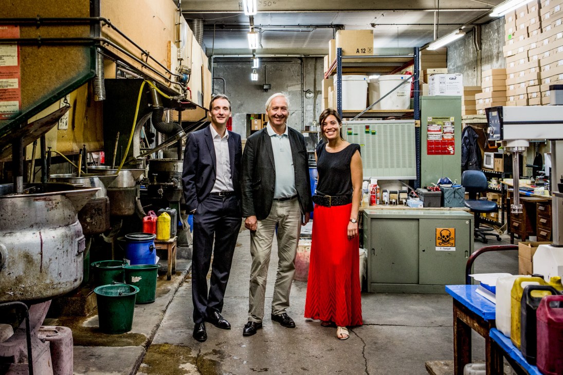 Bruno, Audrey and Thierry Pfirter stand together in the Famaco factory production area.