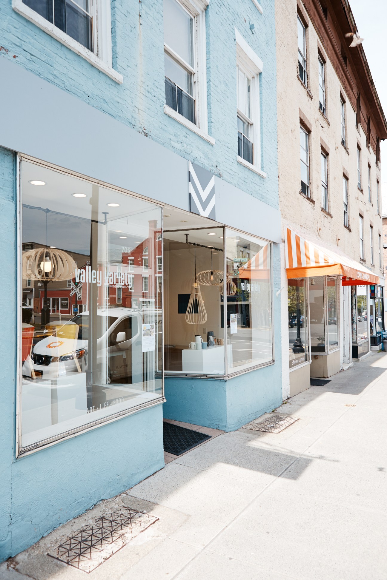 Valley Variety storefront on Warren Street with light blue facade and modern display windows