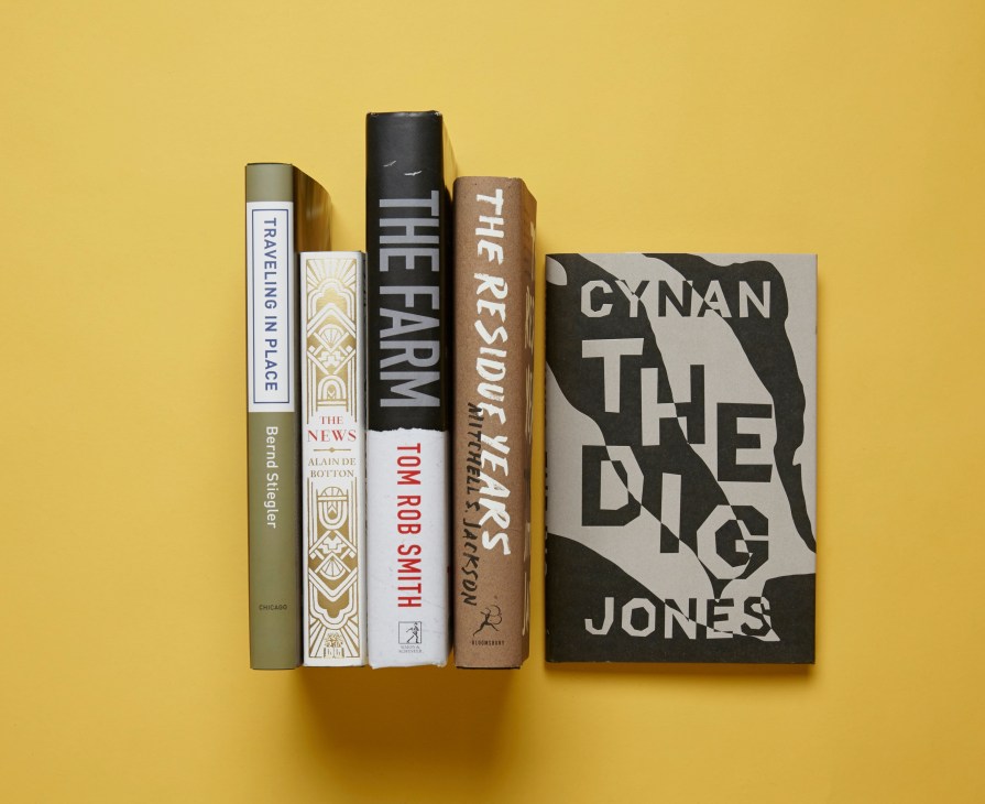Four books arranged on a yellow background including titles by Bernd Stiegler, Alain de Botton, Tom Rob Smith, and Cynan Jones.