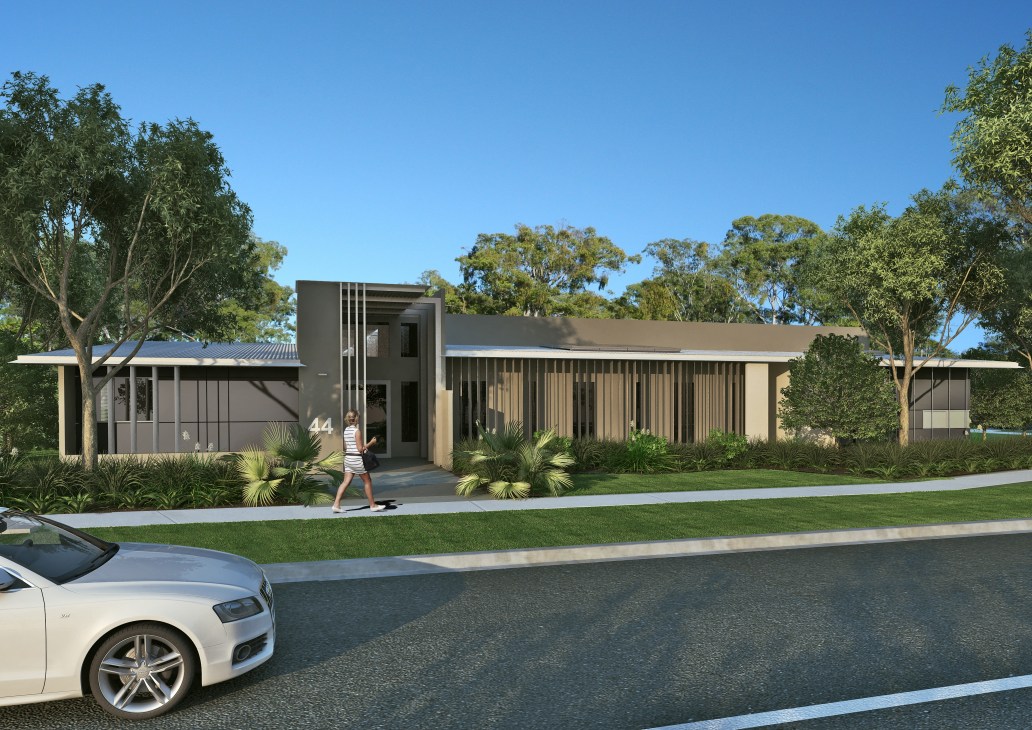 Modern residential home with number 44, featuring dark exterior, green landscaping and trees in Darwin's Breezes Muirhead development.