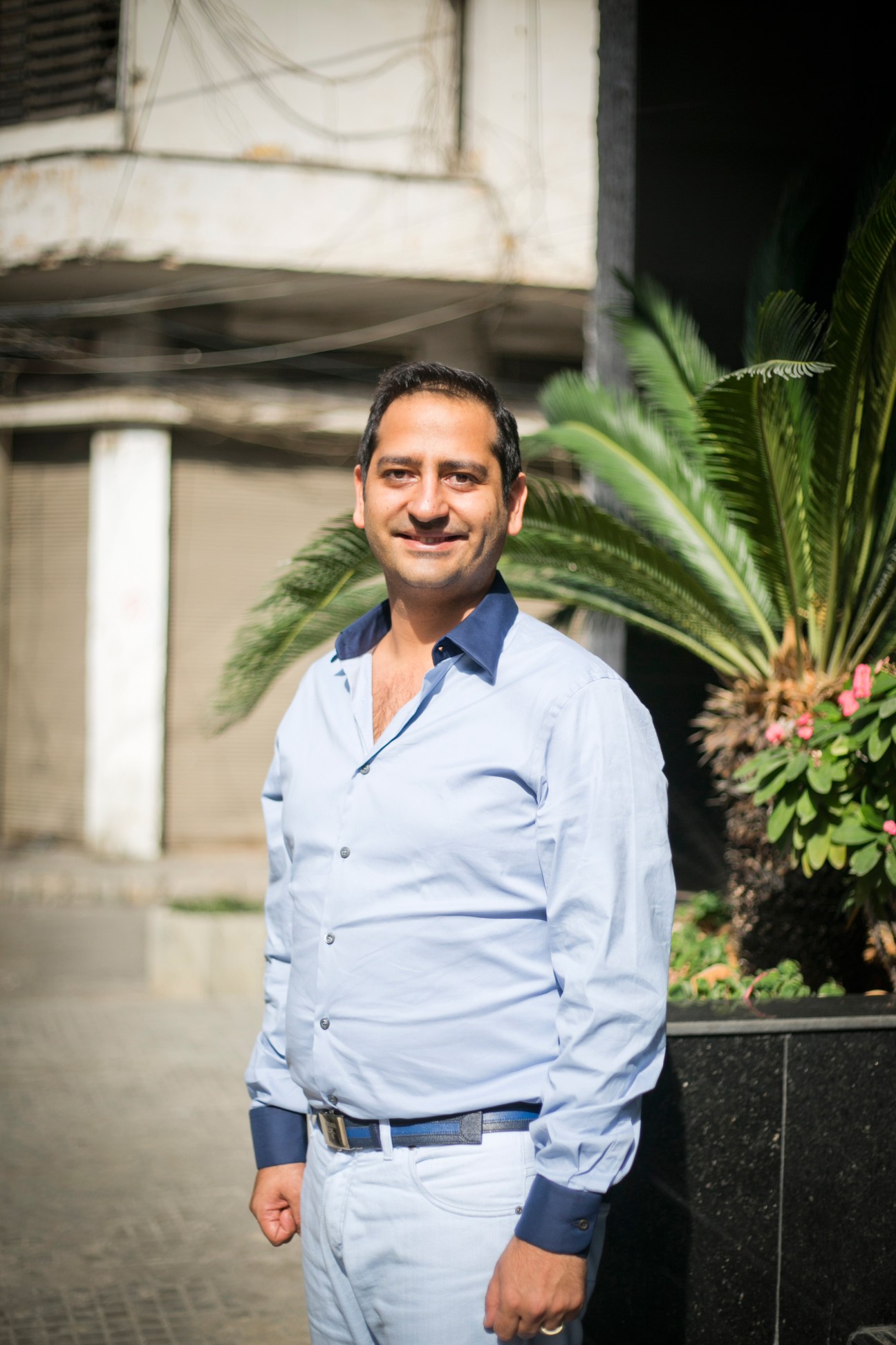 Loutfic Chakardemian stands smiling outside Yeprem's headquarters in Beirut's Bourj Hammoud neighbourhood.