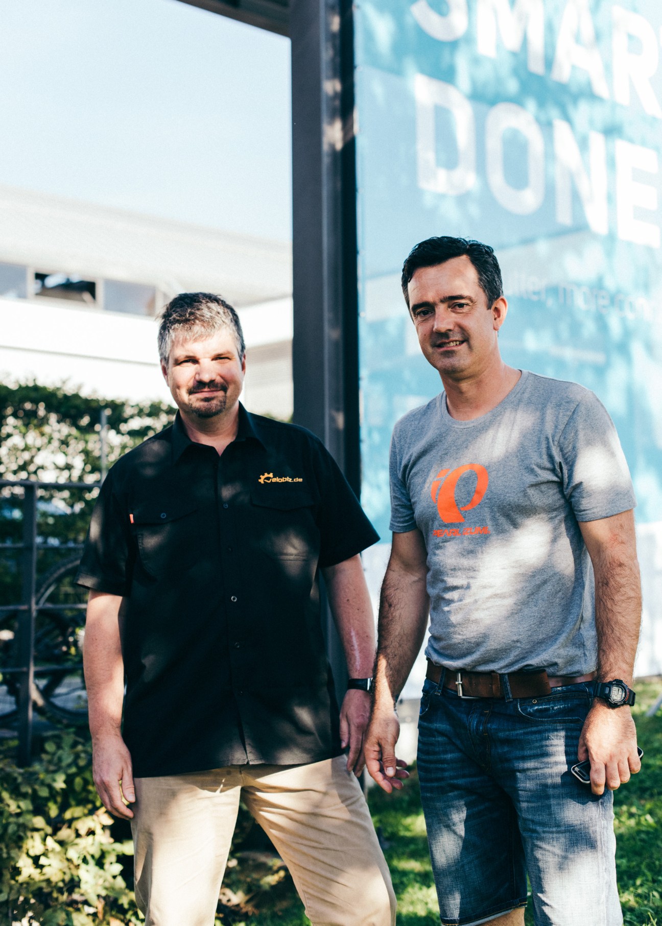 Markus Fritsch and Eurobike show director Dirk Heidrich standing together outdoors at the trade fair.