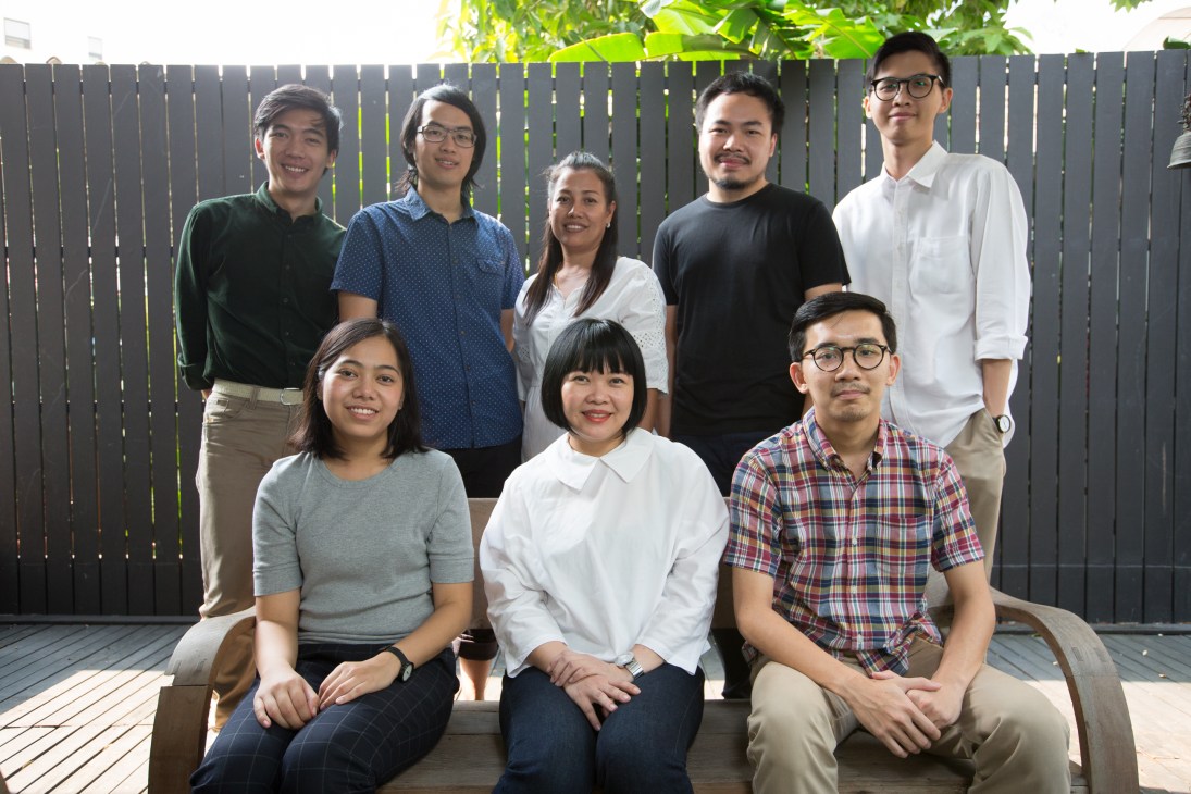 Arisara Chaktranon and her 10-person Onion architecture team pose together outdoors.
