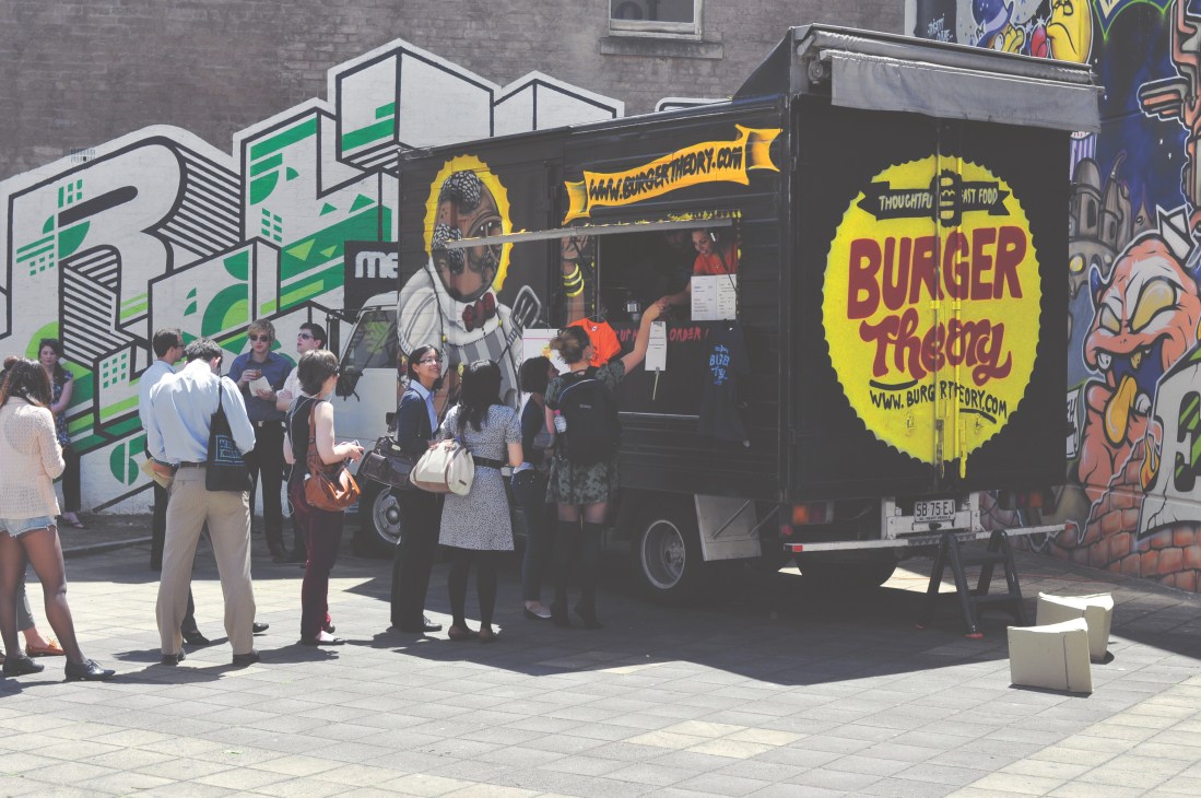 Burger Theory food truck with customers queuing outside on a Sydney street.