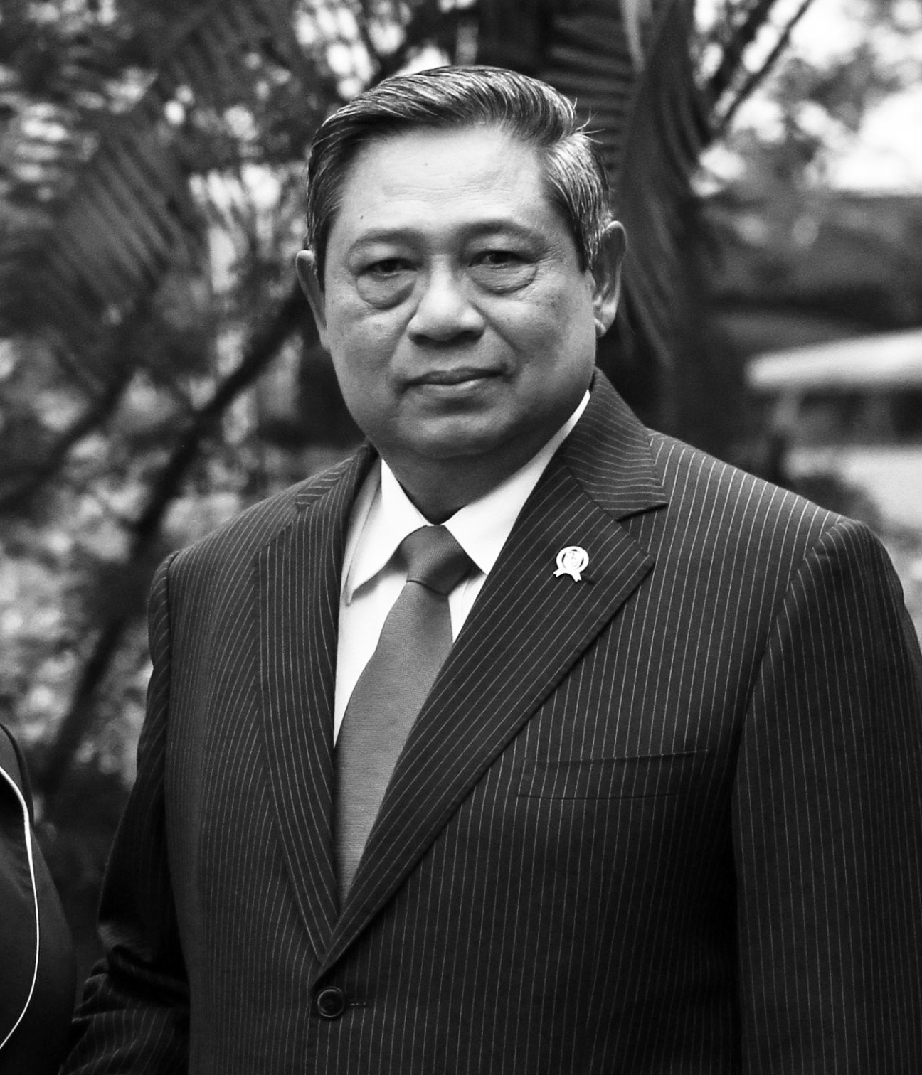 Black and white portrait of Susilo Bambang Yudhoyono in pinstriped suit and tie.