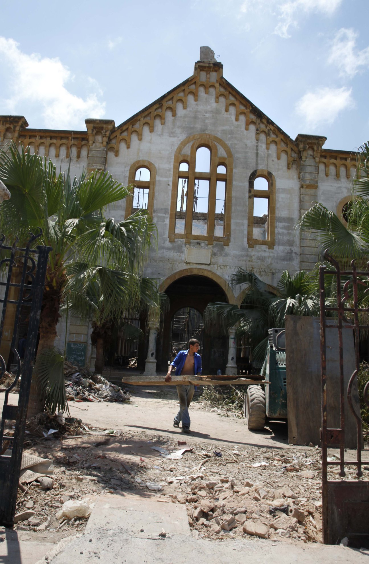 Magen Abraham synagogue in Beirut with ornate stone facade and arched windows under restoration.