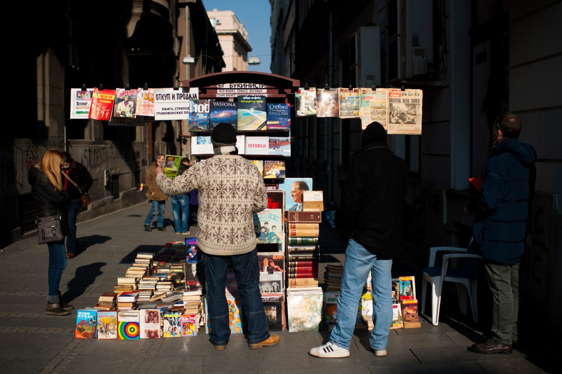 Aleksandar Obradovic's kiosk displaying books, vinyl records and comics on Knez Mihailova street in Belgrade.