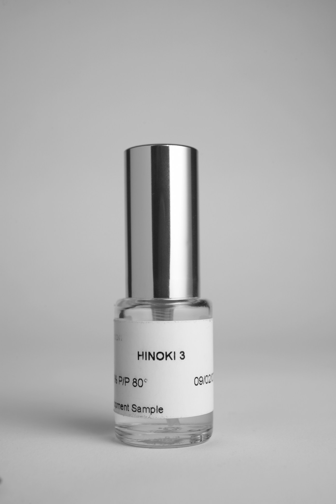 Monocle bespoke fragrance sample bottle labeled 'HINOKI 3' with metallic cap