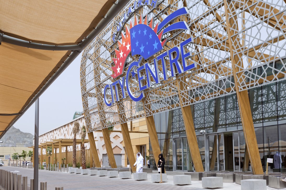 Fujairah City Centre Mall exterior with geometric architectural design and signage.