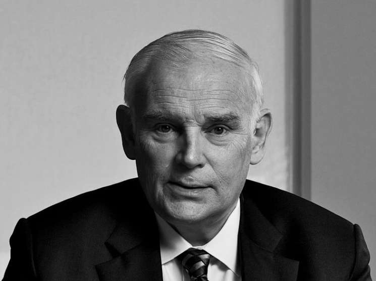 Black and white portrait photograph of Everette Dennis, dean of Northwestern University.