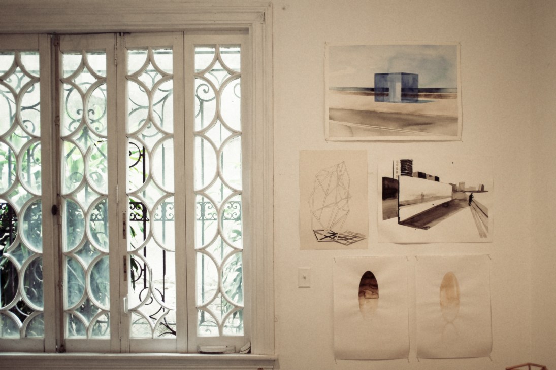 Studies for installations by Rachel Valdés Camejo displayed on white wall next to ornate patterned doors.