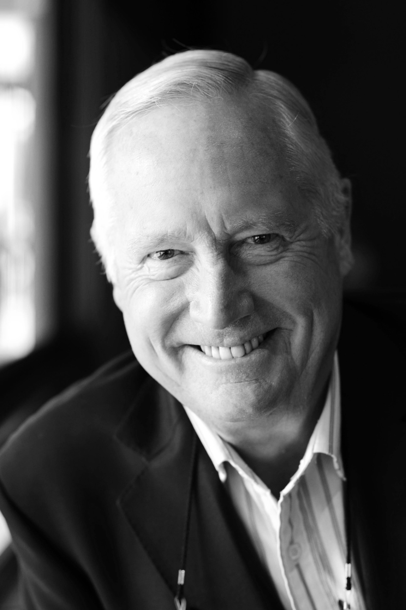 Black and white portrait photograph of Robert Macklin, a journalist from Canberra.