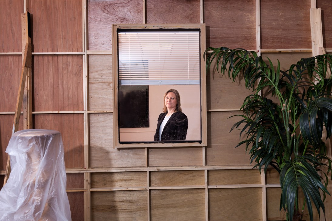 Cindy Holland, Netflix's VP of original content, standing in a framed window at Sunset Bronson Studios