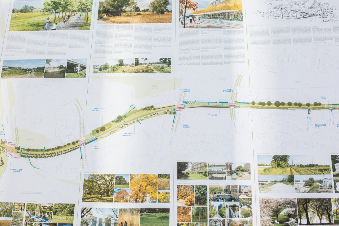 Architectural plans and renderings of the Atlanta BeltLine project layout displayed on printed documents.