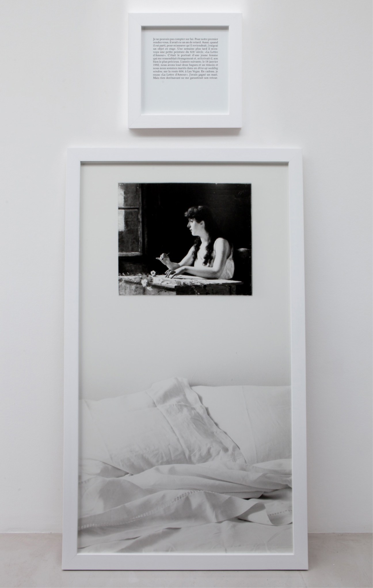 Black and white photograph of a woman in bed with framed text above, part of Sophie Calle's 'Autobiographical Stories' artwork.