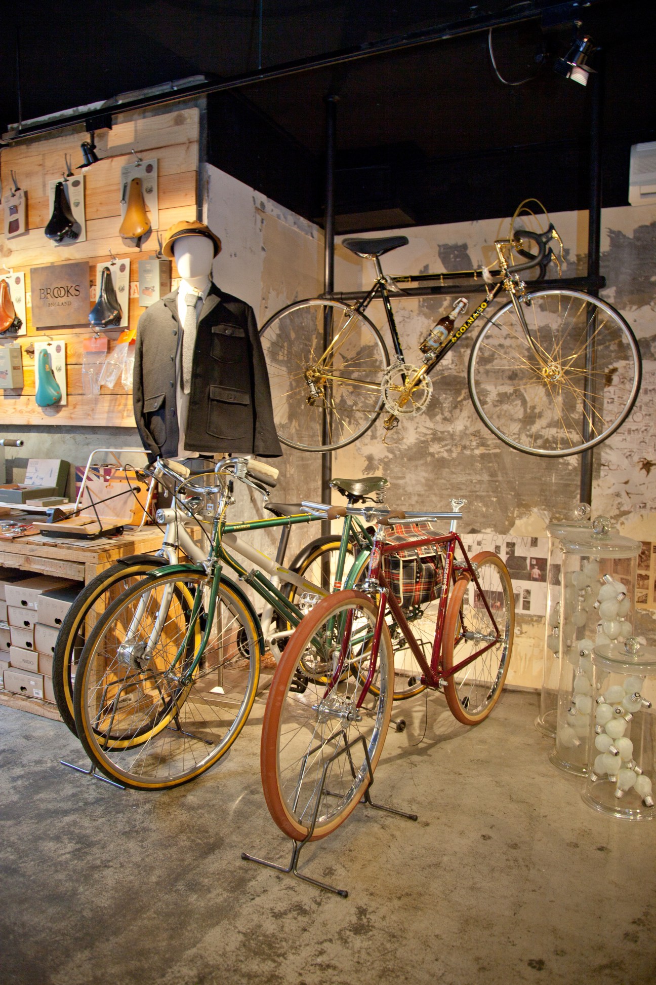 Sense30 bicycle shop interior displaying vintage and bespoke bicycles with cycling accessories and apparel.