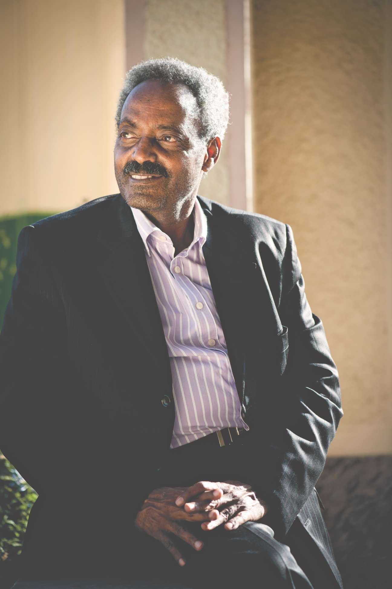 Ambassador Fantahun Haile Michael, AU projects director, poses for a portrait in professional business attire.