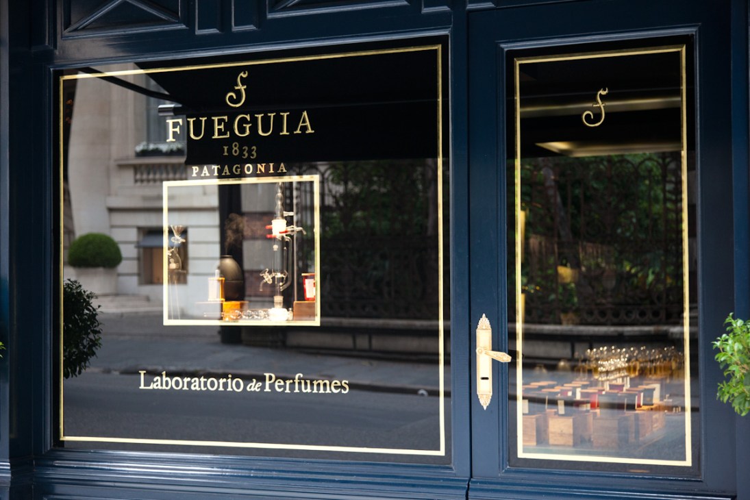 Fueguia perfume laboratory storefront in Buenos Aires with dark blue facade and gold lettering.