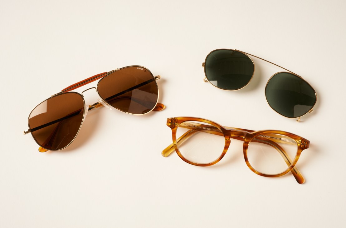 Four pairs of aviator and round-frame sunglasses by Randolph Engineering displayed on a neutral background.