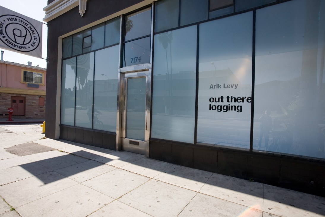 Eighth Veil gallery storefront on Sunset Boulevard showing modern glass facade with signage.