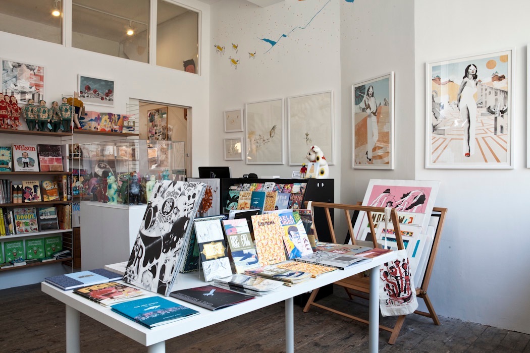 Interior of Nobrow's retail shop on Great Eastern Street displaying books, comics, and illustrated artwork.