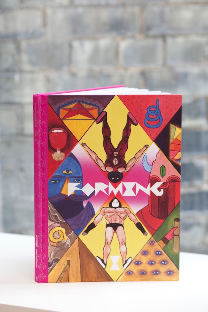 Colorful hardcover book 'Forming Vol 1' by Jesse Moynihan with vibrant illustrated cover featuring geometric shapes and stylized figures.