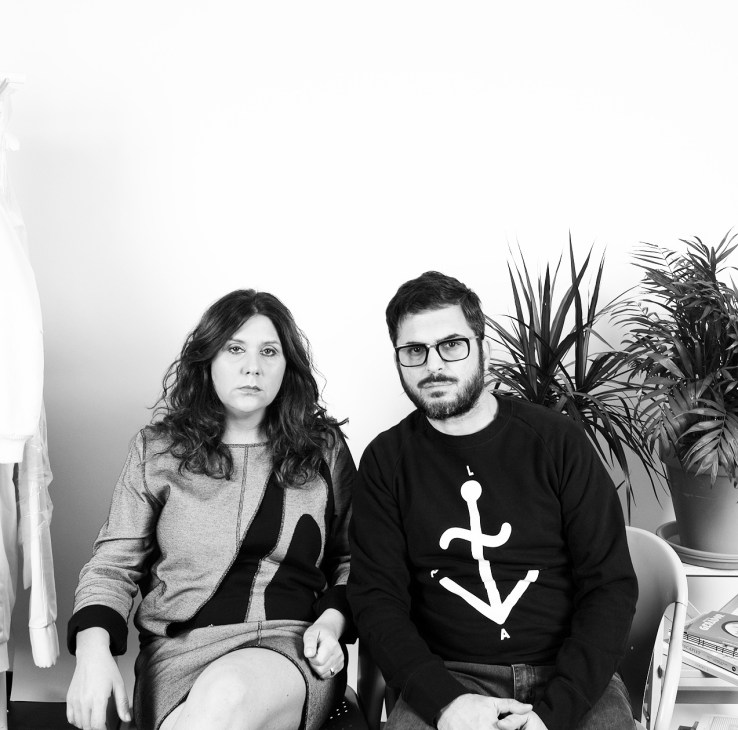 Black and white portrait of Luisa Azevedo and Jorge Sampaio, founders of The Portcorner, seated together.