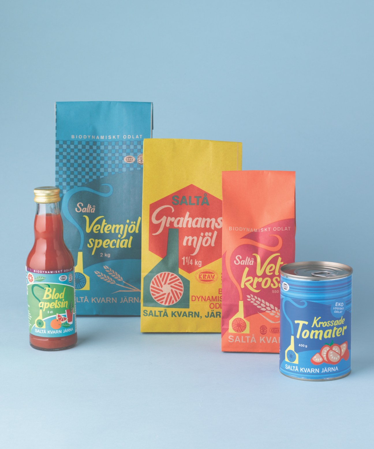 Saltå Kvarn organic and biodynamic flour packaging and products displayed on light blue background.