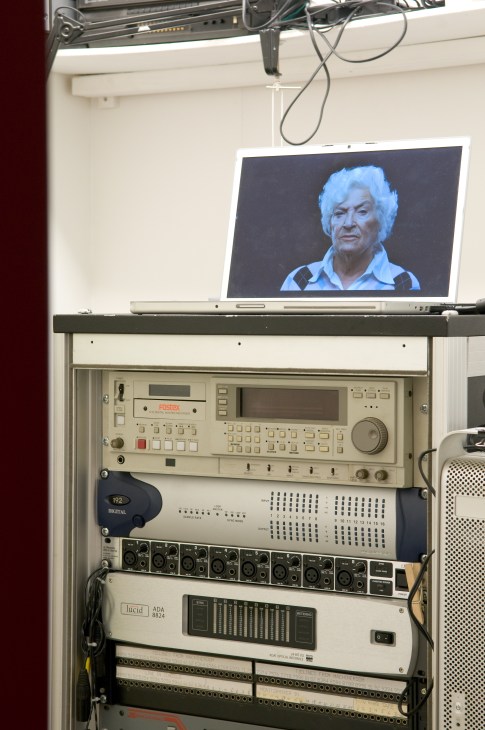 Editing equipment and control panels at Plymserafin with a laptop displaying a portrait above.