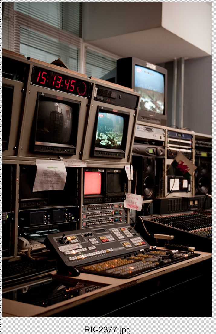 Professional video editing suite with control panels, monitors displaying content, and timecode display at B92 studios.
