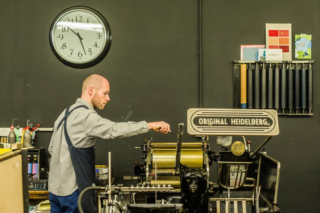 Cédric Chauvelot operates an Original Heidelberg printing press in his Brussels workshop.