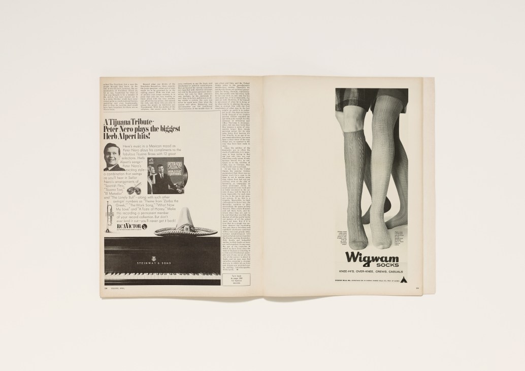 Vintage magazine spread showing Wigwam sock advertisement with close-up of ribbed socks on legs